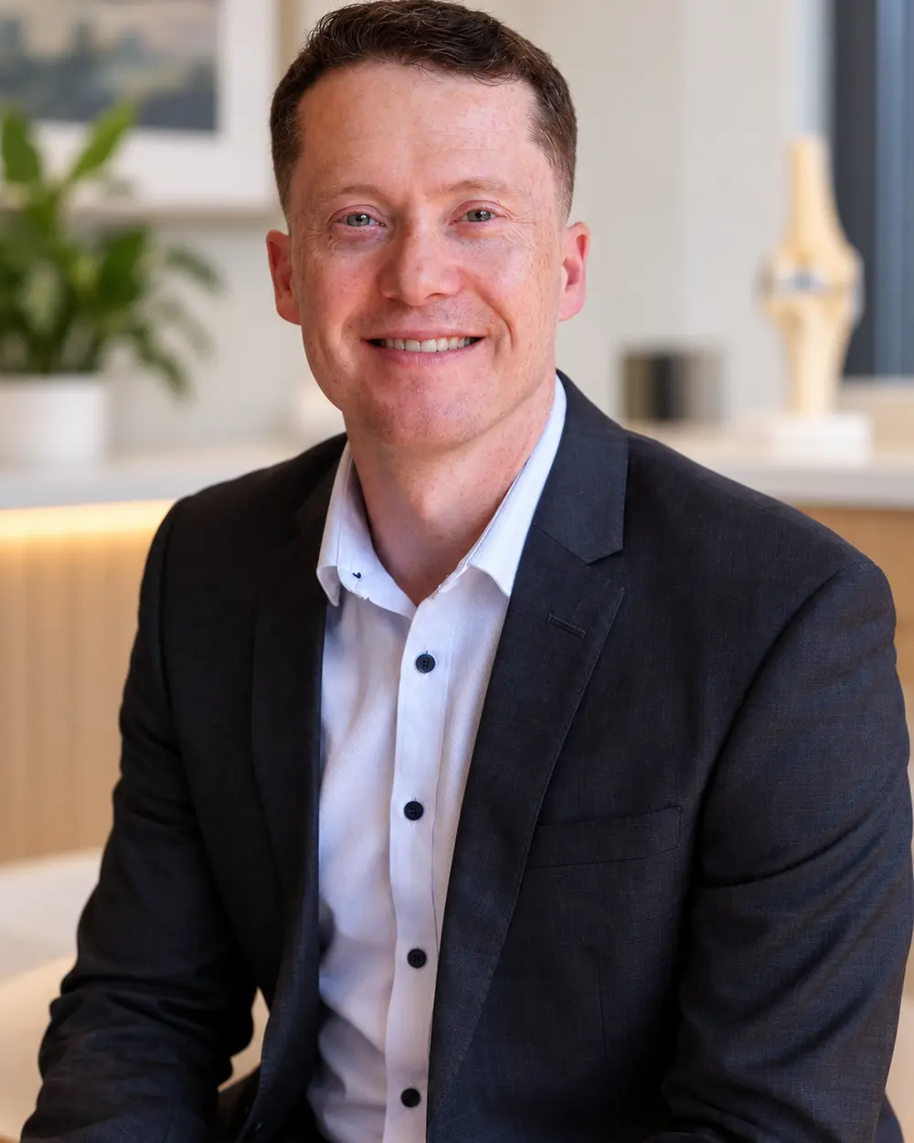 Dr Rob Cooper in his consulting rooms